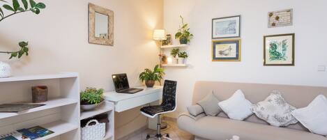 Apartment | Living area | 36-inch flat-screen TV with cable channels