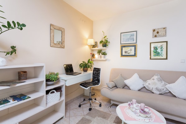 Apartment | Living area | 36-inch flat-screen TV with cable channels - Arca, Apartment With Sea View And Free Parking (Podstrana)