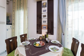 Apartment | Living area | 36-inch flat-screen TV with cable channels - Arca, Apartment With Sea View And Free Parking (Podstrana)