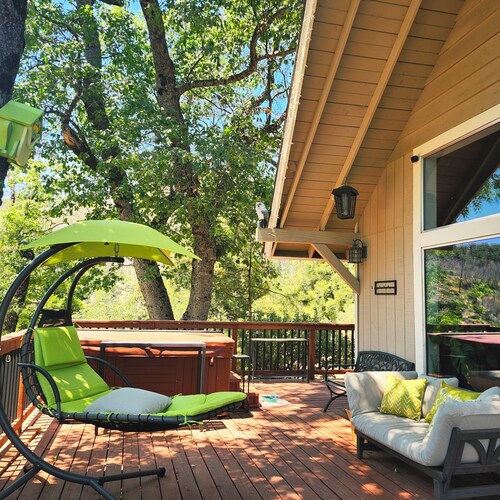 2 Br 2 Ba upstairs in  cabin w/hot tub on 5.6 acre. Next to a Creek /near a lake