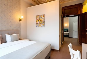 Family Room | Minibar, in-room safe, soundproofing, iron/ironing board