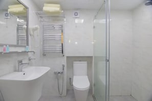 Shower, free toiletries, hair dryer, slippers