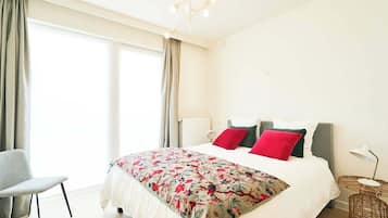 1 habitación, tabla de planchar con plancha, cuna de viaje y wifi