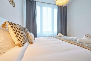 1 habitación, tabla de planchar con plancha, cuna de viaje y wifi