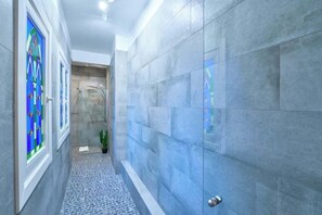 Shower, free toiletries, hair dryer, slippers