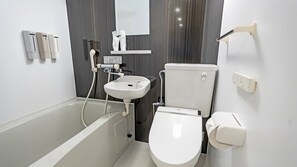 Ensemble douche/baignoire, sèche-cheveux, chaussons, serviettes fournies
