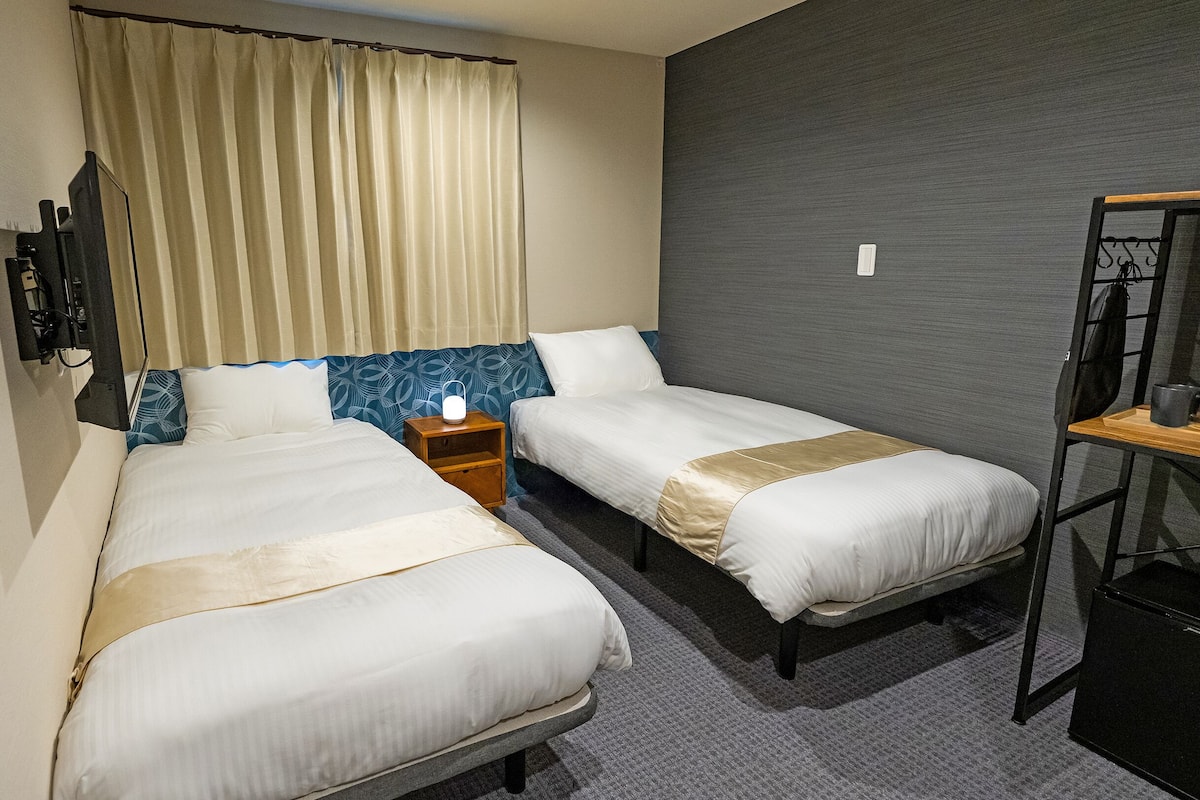 Chambre Standard avec lits jumeaux | Bureau, accĂšs au Wi-Fi (inclus), literie fournie