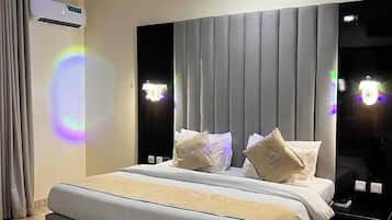 Deluxe Room, Balcony, City View | Desk, laptop workspace, blackout drapes, soundproofing