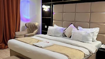 Deluxe Room, Balcony, City View | Desk, laptop workspace, blackout drapes, soundproofing