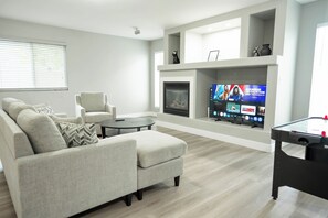 Smart TV, fireplace, foosball