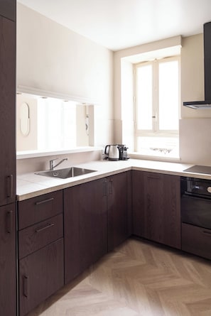 Apartment | Private kitchen | Fridge, oven, stovetop, dishwasher