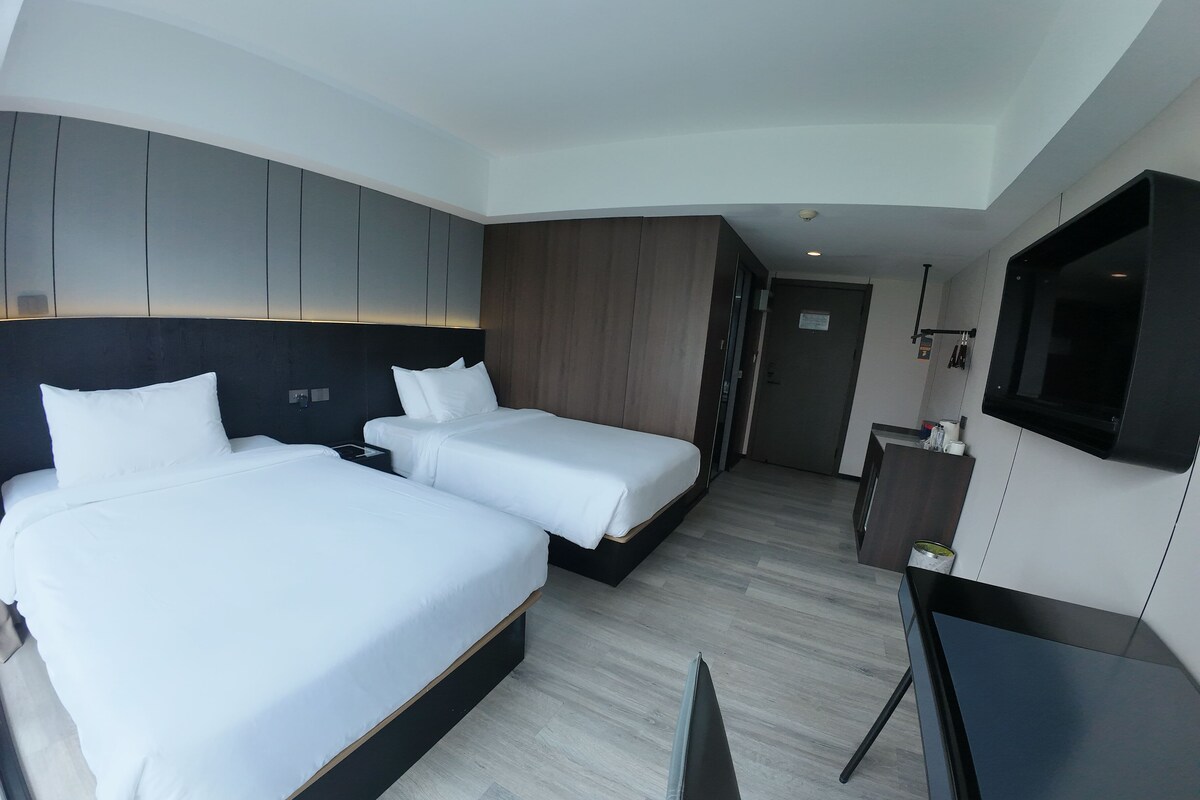 Chambre Deluxe double ou avec lits jumeaux | Bureau, espace de travail pour ordinateurs portables