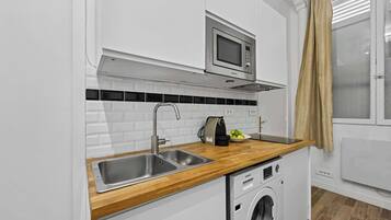 Microwave, stovetop, coffee/tea maker, toaster