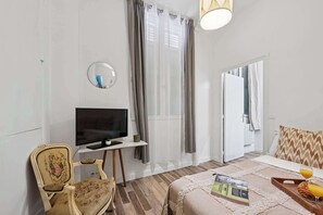 1 bedroom, desk, iron/ironing board, travel cot