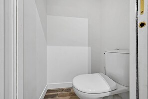 Shower, hair dryer, towels, shampoo