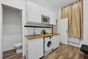 Microwave, stovetop, coffee/tea maker, electric kettle