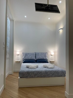 1 غرفة نوم ومكواة/لوح كي وخدمة الإنترنت وملاءات أسرّة