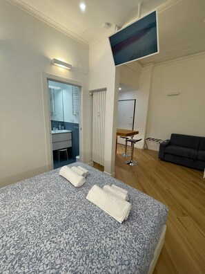 1 غرفة نوم ومكواة/لوح كي وخدمة الإنترنت وملاءات أسرّة