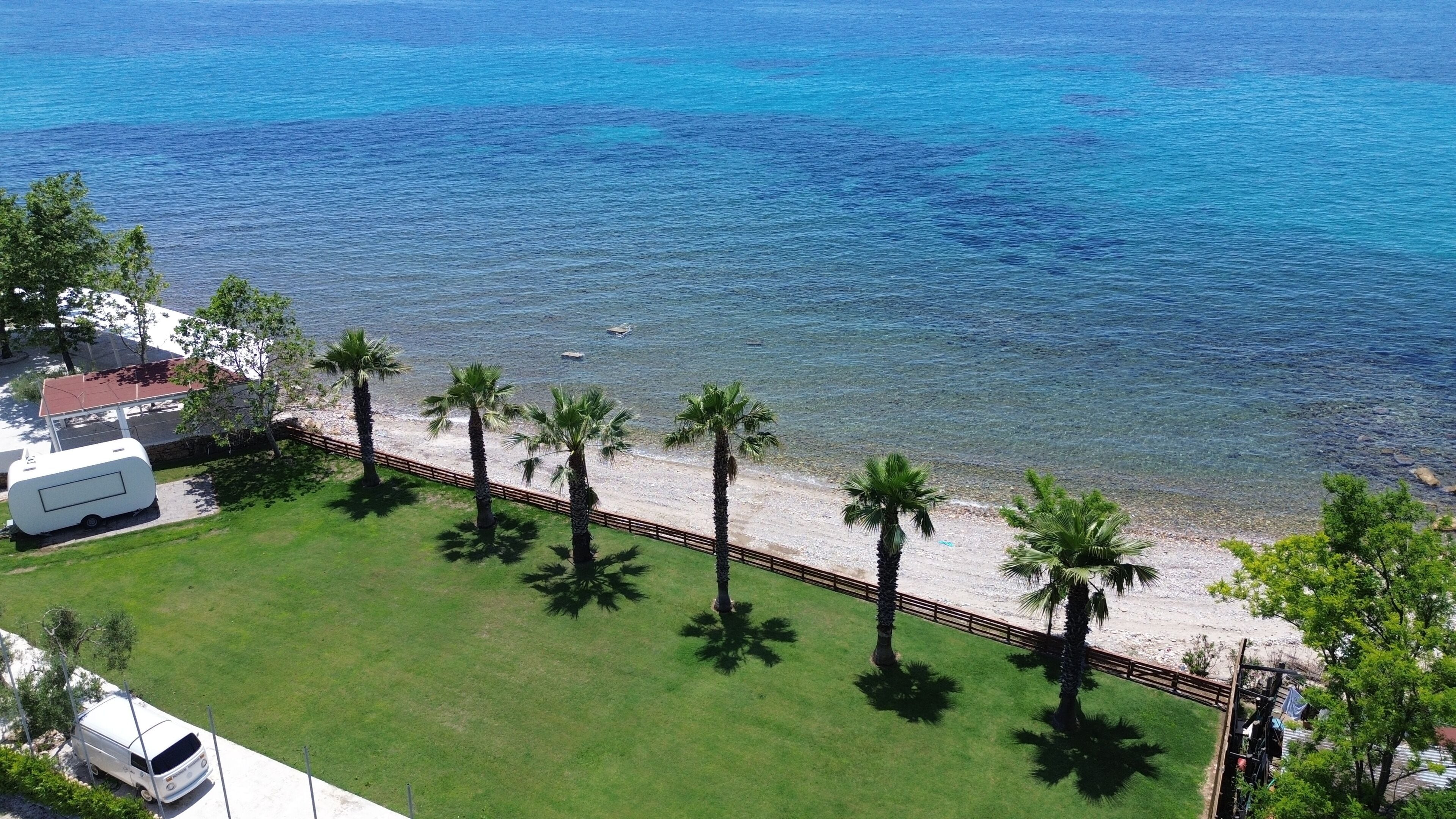 On the beach, sun-loungers, beach umbrellas