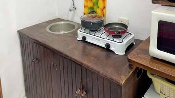 Microwave, stovetop, toaster, cookware/dishes/utensils