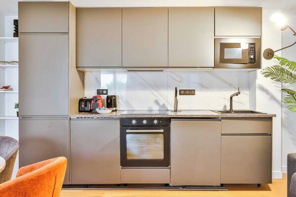Apartment | Private kitchen | Fridge, microwave, oven, stovetop