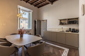 Appartamento Deluxe "vista fiume" | Cocina privada