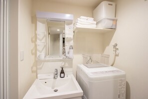 Standard Apartment | Bathroom | Combined shower/bathtub, free toiletries, hair dryer, slippers - HOTEL FAMILIA Hakata East (Fukuoka)