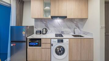 Fridge, microwave, electric kettle, toaster