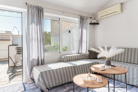 TV. Country House 'Azure Nest' with Private Terrace, Wi-Fi, and Air Conditioning