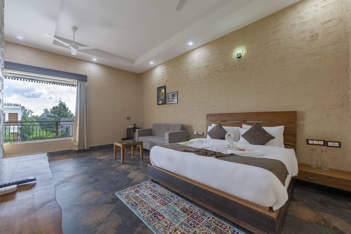 Luxury Quadruple Room, 2 Bedrooms, Balcony, Garden View | Blackout curtains, iron/ironing board, rollaway beds, free WiFi