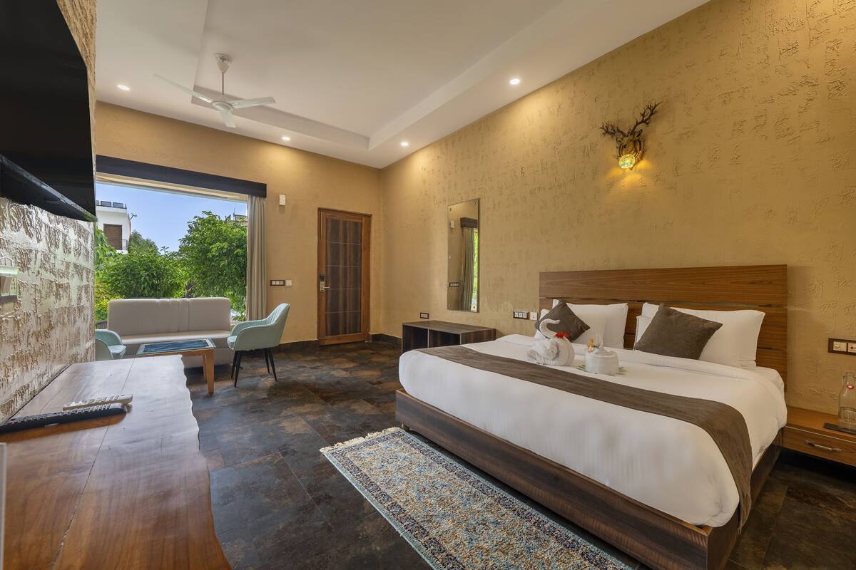 Habitación superior, en la zona del jardín | Cortinas opacas, tabla de planchar con plancha, wifi gratis