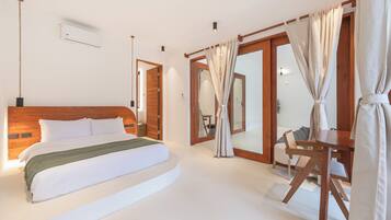 Villa, Private Pool, Garden View | In-room safe, desk, laptop workspace, iron/ironing board