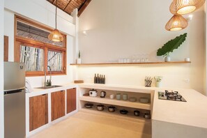 Rice cooker, highchair, paper towels, dining tables