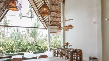 Rice cooker, highchair, paper towels, dining tables