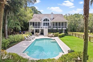 A large house with a swimming pool, surrounded by lush greenery and palm trees. - Boview Hall- Pool, Hot Tub-15 mins to Kiawah (Johns Island)