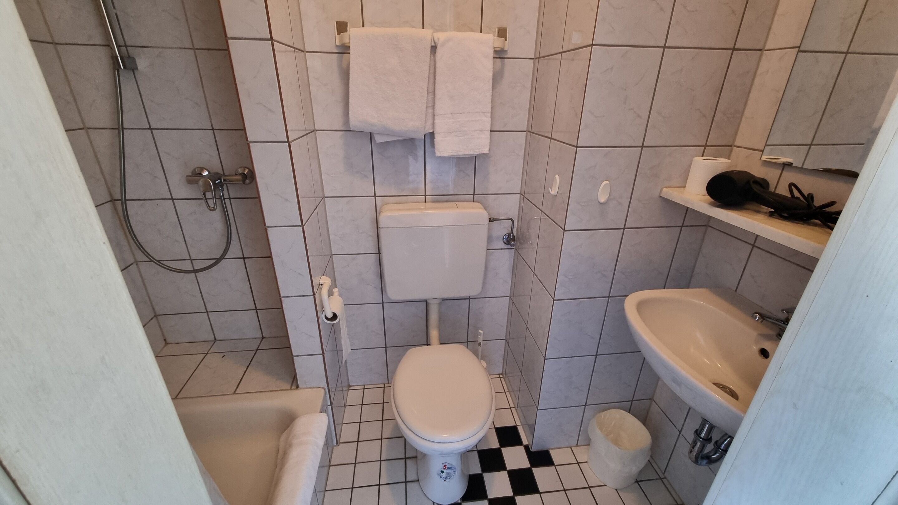 Hair dryer, towels, soap, toilet paper