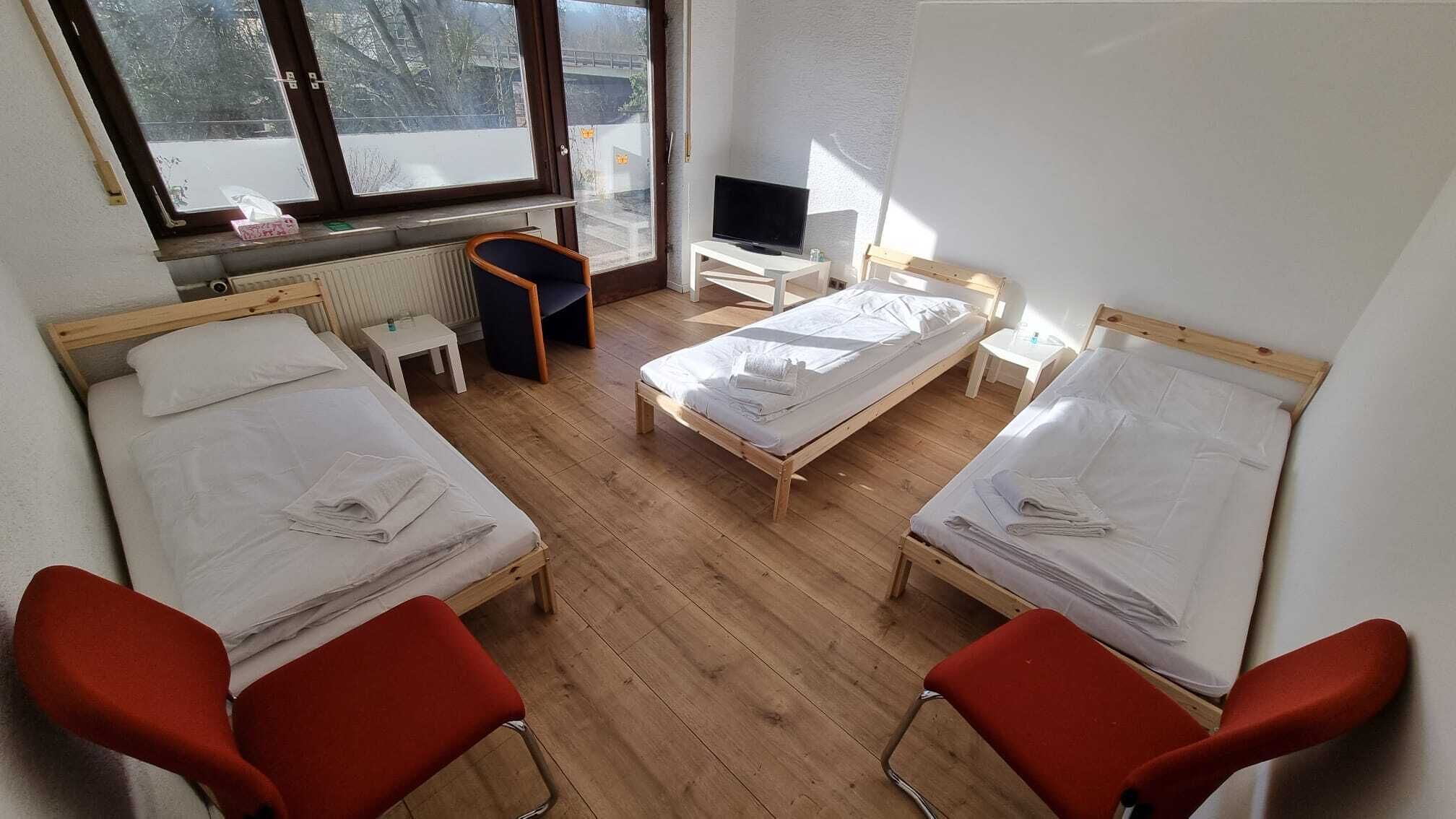 Chambre Triple Économique, salle de bains commune