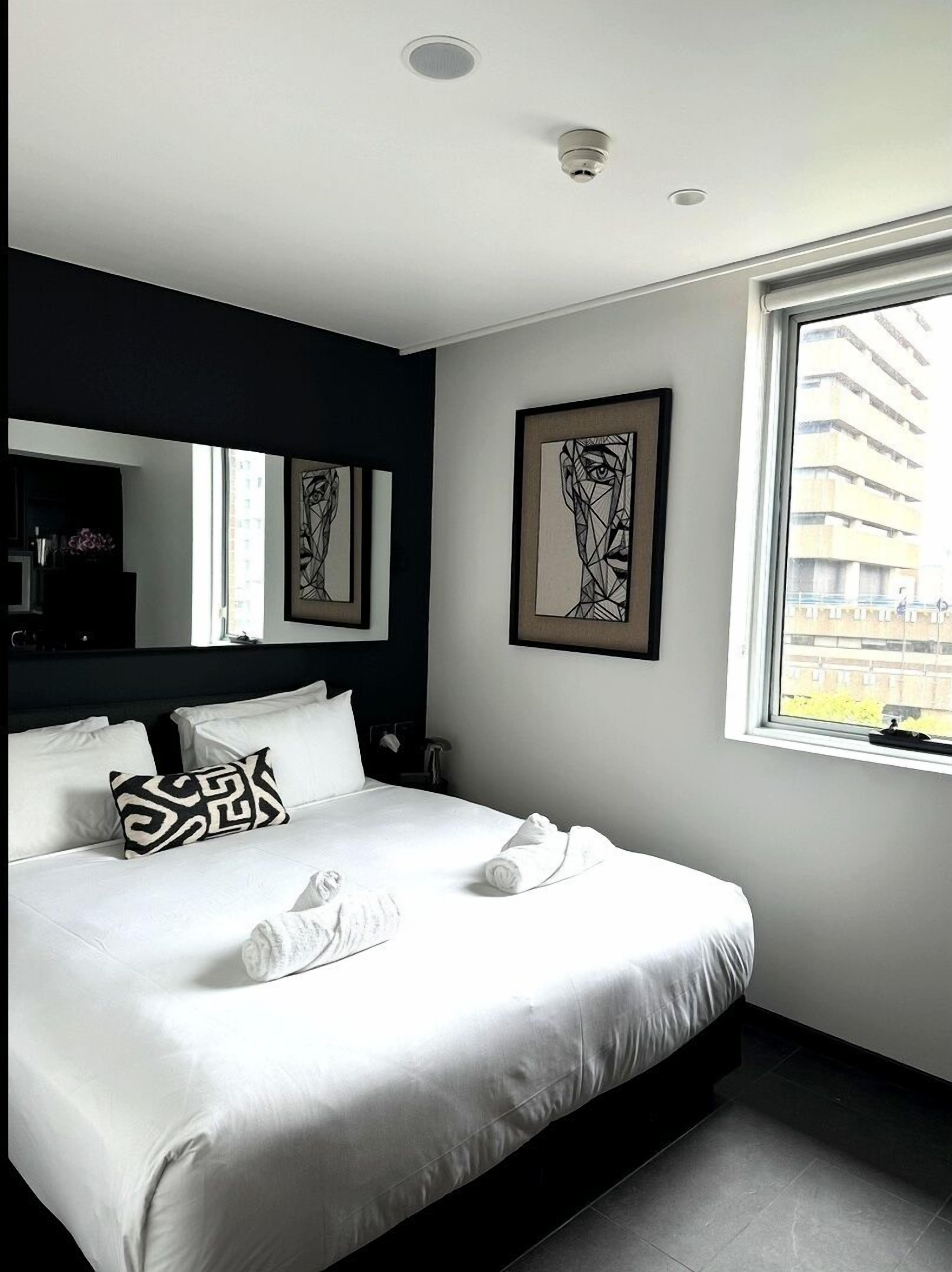 Basic Studio Suite, City View | Premium bedding, minibar, in-room safe, individually decorated