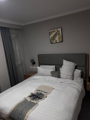 Comfort Room, Balcony, City View | Desk, laptop workspace, free WiFi