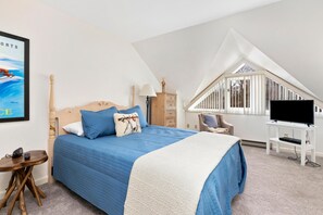 Tabla de planchar con plancha, internet y ropa de cama 