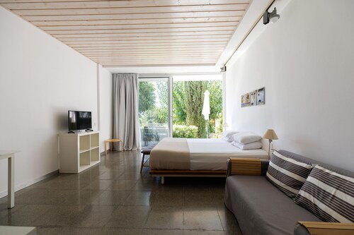 Eupnea | Studio Apartment, Art by PraXis Apartments