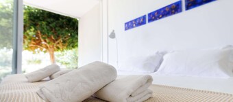Eucrasia | One-Bedroom Apartment, Art by PraXis Apartments
