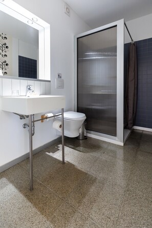 Shower, hair dryer, towels - Euploia | One-Bedroom Apartment, Art by PraXis Apartments (Limassol)