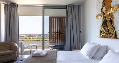 Eurythmia | One-Bedroom Apartment, Art by PraXis Apartments