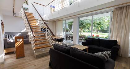 Eupraxia | Three-Bedroom Apartment, Art by PraXis Apartments