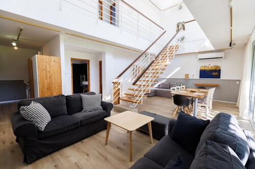 Eupraxia | Three-Bedroom Apartment, Art by PraXis Apartments