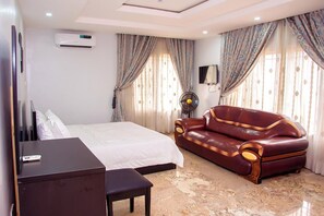 Economy Apartment, Balcony, City View | Desk, laptop workspace, blackout drapes, soundproofing