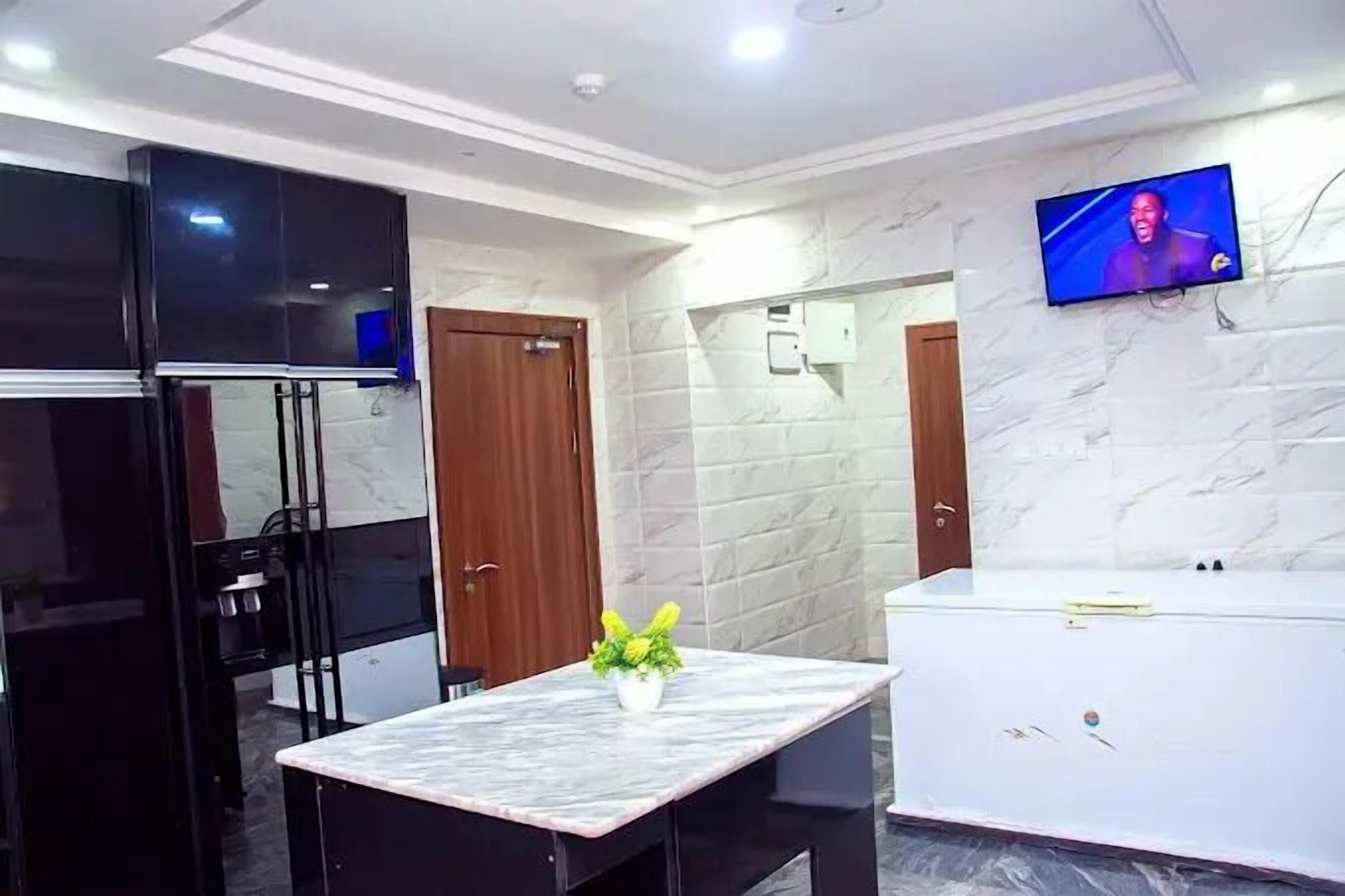Economy Apartment, Balcony, City View | Private kitchen | Fridge, microwave, oven, stovetop