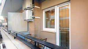 Quarto casal luxo, sacada | Terraço/pátio