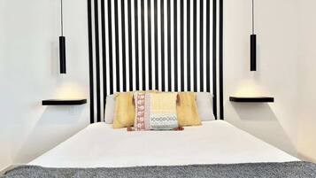 1 bedroom, desk, iron/ironing board, travel crib